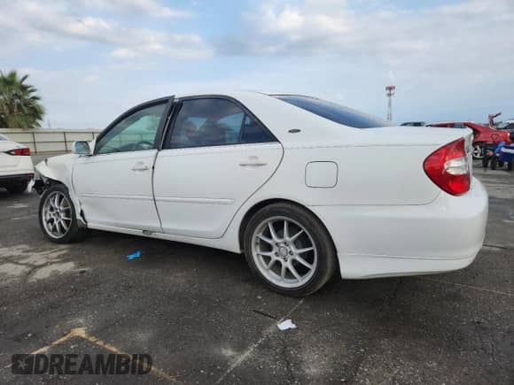 2004 Toyota Camry LE с VIN 4T1BE32K64U267177, выставлен на аукционе Copart как лот 82574475 с пробегом 270 936 миль миль и Списание • Salvage title. История ставок и продаж доступна на DreamBid. Изображение 2.