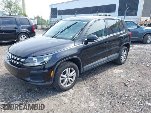 2013 Volkswagen Tiguan SE z VIN WVGAV3AX0DW621305, wystawiony jako IAAI lot #42249707 z przebiegiem 139 500 mil mil oraz . Historia ofert i sprzedaży dostępna na DreamBid. Obrazek 2.
