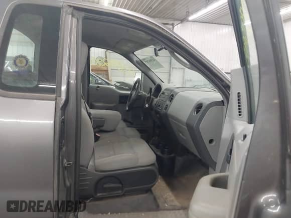 2005 Ford F-150 XL with VIN 1FTRF14W55NB90303, listed as a IAAI auction lot 43398285 with 87,559 mi miles and . Bid and sale history available at DreamBid. Image 5.