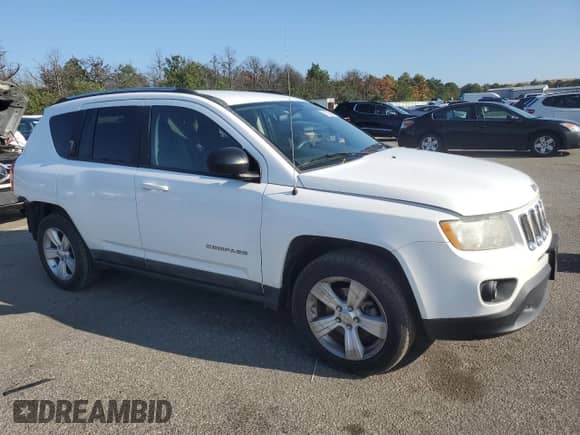 2011 Jeep Compass Latitude z VIN 1J4NT1FB4BD253162, wystawiony jako Copart lot #71593615 z przebiegiem 37 766 mil mil oraz Szkoda całkowita • Salvage title. Historia ofert i sprzedaży dostępna na DreamBid. Obrazek 4.