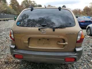 2001 Hyundai Santa Fe GLS с VIN KM8SC83D71U084837, выставлен на аукционе Copart как лот 77588984 с пробегом 102 585 миль миль и Списание • Salvage title. История ставок и продаж доступна на DreamBid. Изображение 6.