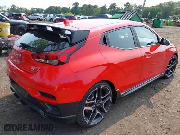 2022 Hyundai Veloster z VIN KMHT36AH5NU015388, wystawiony jako IAAI lot #42492097 z przebiegiem 31 757 mil mil oraz . Historia ofert i sprzedaży dostępna na DreamBid. Obrazek 4.