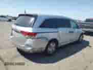 2015 Honda Odyssey LX with VIN 5FNRL5H21FB087306, listed as a Copart auction lot 70698795 with 148,351 mi miles and Salvage title. Bid and sale history available at DreamBid. Image 3.