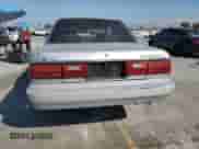 1990 Toyota Camry with VIN JT2VV22E3L3003353, listed as a Copart auction lot 68489125 with 131,662 mi miles and Clean title. Bid and sale history available at DreamBid. Image 6.