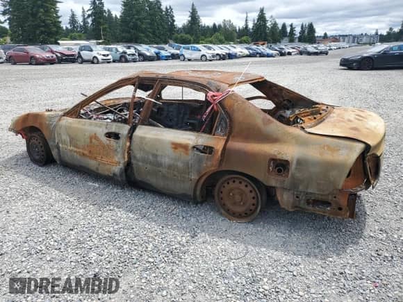 1997 Honda Accord LX с VIN 1HGCD5531VA055867, выставлен на аукционе Copart как лот 57560015 с пробегом Не указан миль и На запчасти • Non repairable. История ставок и продаж доступна на DreamBid. Изображение 2.