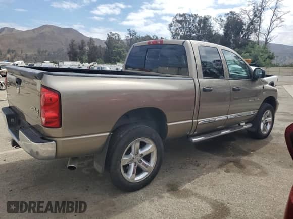 2007 Dodge 1500 SLT with VIN 1D7HU18277S197014, listed as a Copart auction lot 80510905 with 170,390 mi miles and Salvage title. Bid and sale history available at DreamBid. Image 3.
