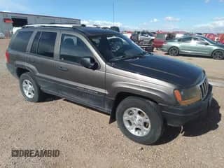 2003 Jeep Grand Cherokee Laredo с VIN 1J4GW48N1YC109592, выставлен на аукционе IAAI как лот 35052235 с пробегом 167 712 миль миль и . История ставок и продаж доступна на DreamBid. Изображение 1.