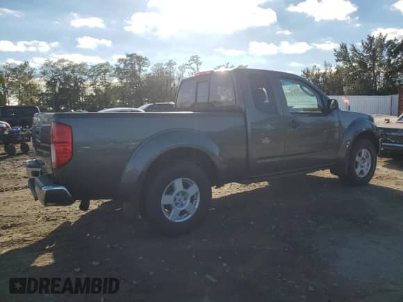 2006 Nissan Frontier SE with VIN 1N6AD06W96C406111, listed as a Copart auction lot 82482145 with 104,030 mi miles and Clean title. Bid and sale history available at DreamBid. Image 3.