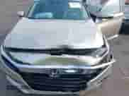 2018 Honda Accord Touring z VIN 1HGCV3F97JA017073, wystawiony jako IAAI lot #42413373 z przebiegiem 91 695 mil mil oraz . Historia ofert i sprzedaży dostępna na DreamBid. Obrazek 6.