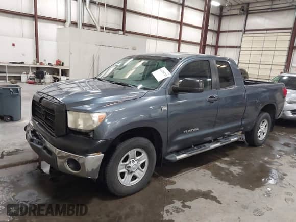 2008 Toyota Tundra z VIN 5TFRT54198X023567, wystawiony jako IAAI lot #43289726 z przebiegiem 185 308 mil mil oraz . Historia ofert i sprzedaży dostępna na DreamBid. Obrazek 2.