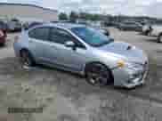 2017 Subaru WRX Premium with VIN JF1VA1E60H8814044, listed as a Copart auction lot 60159555 with 112,395 mi miles and Salvage title. Bid and sale history available at DreamBid. Image 4.