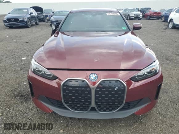 2023 BMW i4 eDrive40 with VIN WBY73AW09PFP11995, listed as a Copart auction lot 66709265 with 31,084 mi miles and Salvage title. Bid and sale history available at DreamBid. Image 5.