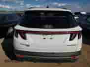 2022 Hyundai Tucson Blue with VIN KM8JBCA17NU020149, listed as a Copart auction lot 83856095 with 81,788 mi miles and Salvage title. Bid and sale history available at DreamBid. Image 6.