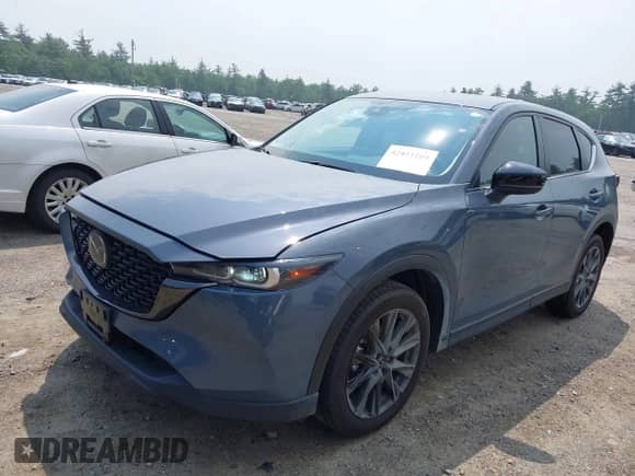 2023 Mazda CX-5 S Carbon Edition z VIN JM3KFBCM5P0179462, wystawiony jako IAAI lot #42451109 z przebiegiem 14 170 mil mil oraz . Historia ofert i sprzedaży dostępna na DreamBid. Obrazek 17.
