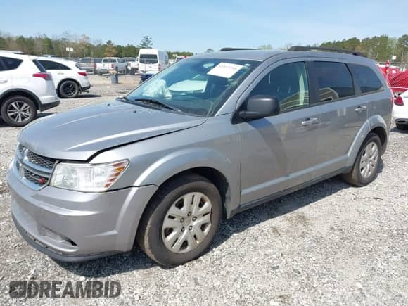 2019 Dodge Journey SE Value with VIN 3C4PDCAB4KT797380, listed as a IAAI auction lot 41937399 with 109,974 mi miles and . Bid and sale history available at DreamBid. Image 2.