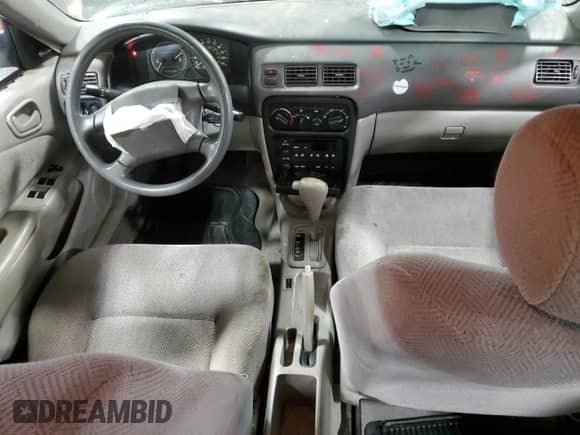 2001 Chevrolet Prizm с VIN 1Y1SK54861Z432455, выставлен на аукционе Copart как лот 85512964 с пробегом Не указан миль и Списание • Salvage title. История ставок и продаж доступна на DreamBid. Изображение 8.