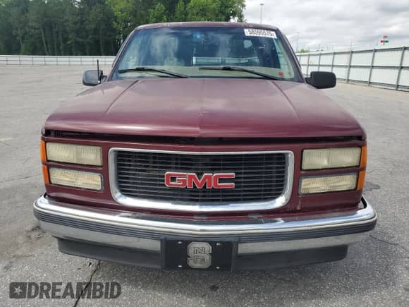 1997 GMC Sierra 1500 z VIN 1GTEC19R6VE549846, wystawiony jako Copart lot #58595575 z przebiegiem 209 913 mil mil oraz Szkoda całkowita • Salvage title. Historia ofert i sprzedaży dostępna na DreamBid. Obrazek 5.