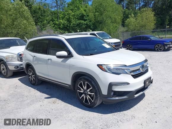 2021 Honda Pilot Touring 8-Passenger z VIN 5FNYF5H98MB037807, wystawiony jako IAAI lot #42136047 z przebiegiem 80 990 mil mil oraz . Historia ofert i sprzedaży dostępna na DreamBid. Obrazek 1.