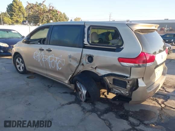 2014 Toyota Sienna L with VIN 5TDZK3DC0ES435998, listed as a IAAI auction lot 43475071 with 69,397 mi miles and . Bid and sale history available at DreamBid. Image 3.