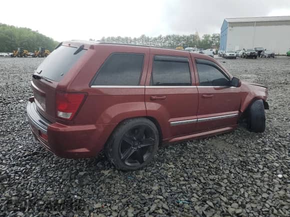 2007 Jeep Grand Cherokee SRT-8 с VIN 1J8HR78397C508811, выставлен на аукционе Copart как лот 57449555 с пробегом Не указан миль и Списание • Salvage title. История ставок и продаж доступна на DreamBid. Изображение 3.