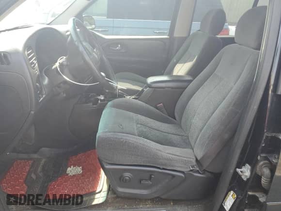 2005 Chevrolet TrailBlazer LT with VIN 1GNET16S256190469, listed as a Copart auction lot 61998485 with 216,435 mi miles and Salvage title. Bid and sale history available at DreamBid. Image 7.