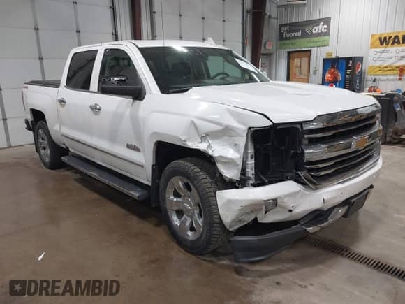 2017 Chevrolet Silverado 1500 High Country z VIN 3GCUKTEC1HG112099, wystawiony jako IAAI lot #42353263 z przebiegiem 81 415 mil mil oraz . Historia ofert i sprzedaży dostępna na DreamBid. Obrazek 1.