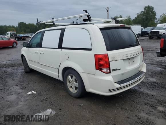 2012 Dodge Grand Caravan SXT z VIN 2C4RDGCG6CR264248, wystawiony jako Copart lot #85174475 z przebiegiem Nie podano mil oraz Czysty tytuł • Clean title. Historia ofert i sprzedaży dostępna na DreamBid. Obrazek 2.