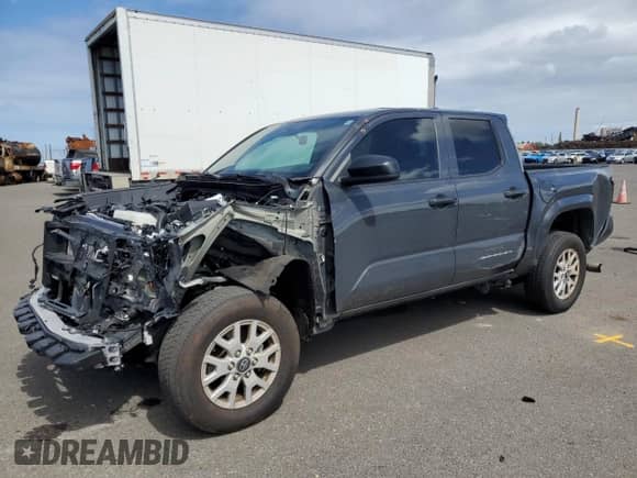 2024 Toyota Tacoma SR with VIN 3TYKD5HN7RT003129, listed as a Copart auction lot 63349125 with 15,244 mi miles and Salvage title. Bid and sale history available at DreamBid. Image 1.