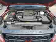 2024 Nissan Frontier Pro-4X with VIN 1N6ED1EK9RN612639, listed as a Copart auction lot 69298615 with 15,552 mi miles and Salvage title. Bid and sale history available at DreamBid. Image 11.