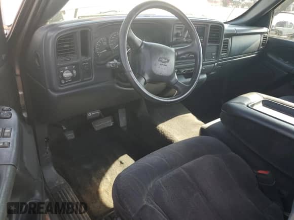 2000 Chevrolet Silverado 1500 LS with VIN 1GCEC14V6YE100403, listed as a Copart auction lot 70000125 with 208,594 mi miles and Salvage title. Bid and sale history available at DreamBid. Image 8.