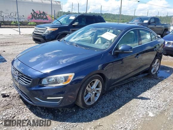 2015 Volvo S60 T5 Drive-E Premier with VIN YV126MFK9F1337917, listed as a IAAI auction lot 42518123 with 79,265 mi miles and . Bid and sale history available at DreamBid. Image 2.