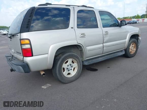 2004 Chevrolet Tahoe LT z VIN 1GNEC13Z74J171381, wystawiony jako IAAI lot #42545235 z przebiegiem 159 848 mil mil oraz . Historia ofert i sprzedaży dostępna na DreamBid. Obrazek 4.