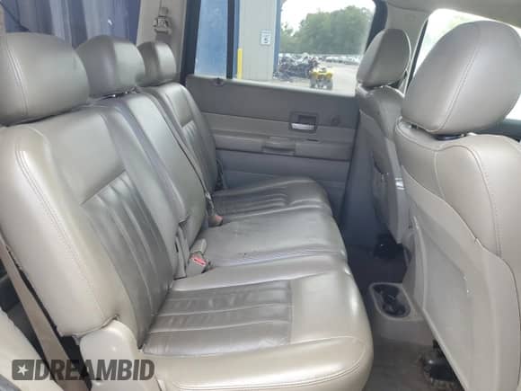 2004 Dodge Durango Limited with VIN 1D4HB58D54F180809, listed as a Copart auction lot 70879585 with 99,426 mi miles and Salvage title. Bid and sale history available at DreamBid. Image 11.
