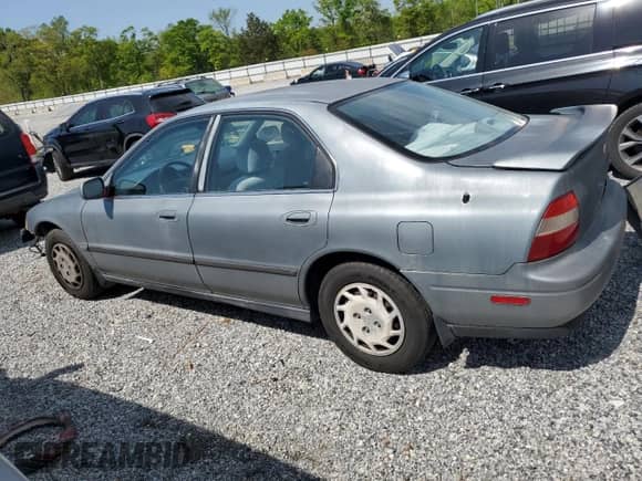 1994 Honda Accord LX z VIN 1HGCD5636RA123553, wystawiony jako Copart lot #50878795 z przebiegiem 155 804 mil mil oraz Szkoda całkowita • Salvage title. Historia ofert i sprzedaży dostępna na DreamBid. Obrazek 2.