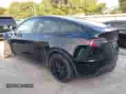 2023 Tesla Model Y Long Range z VIN 7SAYGAEE7PF767951, wystawiony jako IAAI lot #43128878 z przebiegiem 36 431 mil mil oraz . Historia ofert i sprzedaży dostępna na DreamBid. Obrazek 3.