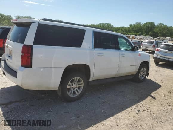 2019 Chevrolet Suburban LT with VIN 1GNSKHKCXKR405488, listed as a Copart auction lot 57905295 with 147,618 mi miles and Salvage title. Bid and sale history available at DreamBid. Image 3.