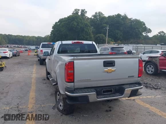 2018 Chevrolet Colorado 2WD Work Truck with VIN 1GCHSBEA5J1309940, listed as a IAAI auction lot 43315319 with 133,539 mi miles and . Bid and sale history available at DreamBid. Image 3.