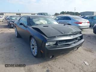 2009 Dodge Challenger SRT-8 with VIN 2B3LJ74W29H549226, listed as a IAAI auction lot 41253460 with 125,386 mi miles and . Bid and sale history available at DreamBid. Image 1.