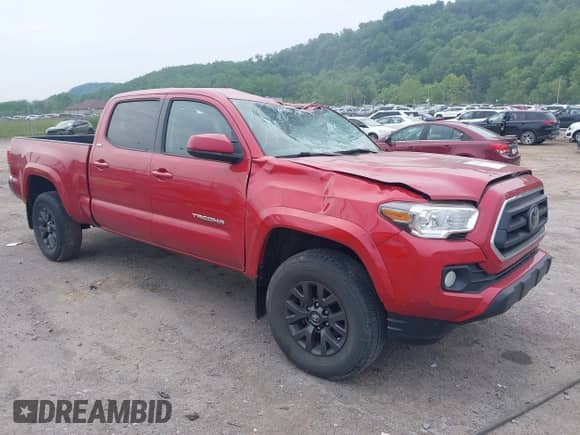2021 Toyota Tacoma SR5 z VIN 3TYDZ5BN1MT002232, wystawiony jako IAAI lot #42374170 z przebiegiem 16 465 mil mil oraz . Historia ofert i sprzedaży dostępna na DreamBid. Obrazek 1.