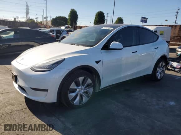 2023 Tesla Model Y Long Range with VIN 7SAYGDEE8PA093209, listed as a Copart auction lot 80299485 with 90,434 mi miles and Salvage title. Bid and sale history available at DreamBid. Image 1.