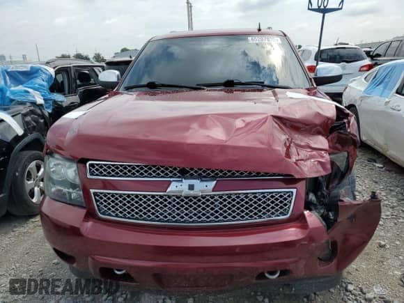 2011 Chevrolet Tahoe LTZ with VIN 1GNSKCE00BR315500, listed as a Copart auction lot 65207035 with 137,422 mi miles and Salvage title. Bid and sale history available at DreamBid. Image 5.