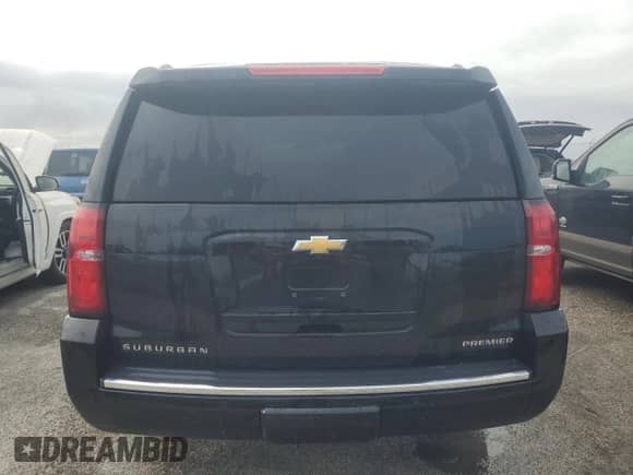 2020 Chevrolet Suburban with VIN 1GNSCJKJ4LR283294, listed as a Copart auction lot 75355194 with Not provided miles and Non repairable. Bid and sale history available at DreamBid. Image 6.