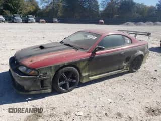 1998 Ford Mustang GT z VIN 1FAFP42X1WF201246, wystawiony jako Copart lot #82541825 z przebiegiem 153 619 mil mil oraz Czysty tytuł • Clean title. Historia ofert i sprzedaży dostępna na DreamBid. Obrazek 1.