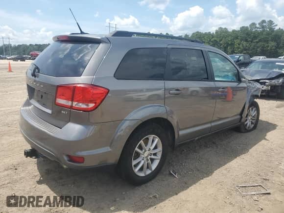 2013 Dodge Journey SXT with VIN 3C4PDCBG9DT502738, listed as a Copart auction lot 66897375 with 155,801 mi miles and Salvage title. Bid and sale history available at DreamBid. Image 3.
