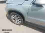 2011 Volkswagen Tiguan S with VIN WVGAV7AX1BW555710, listed as a IAAI auction lot 43025250 with 174,370 mi miles and . Bid and sale history available at DreamBid. Image 6.