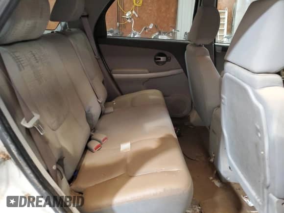 2005 Chevrolet Equinox LS z VIN 2CNDL23F956110642, wystawiony jako Copart lot #69178734 z przebiegiem Nie podano mil oraz Szkoda całkowita • Salvage title. Historia ofert i sprzedaży dostępna na DreamBid. Obrazek 11.