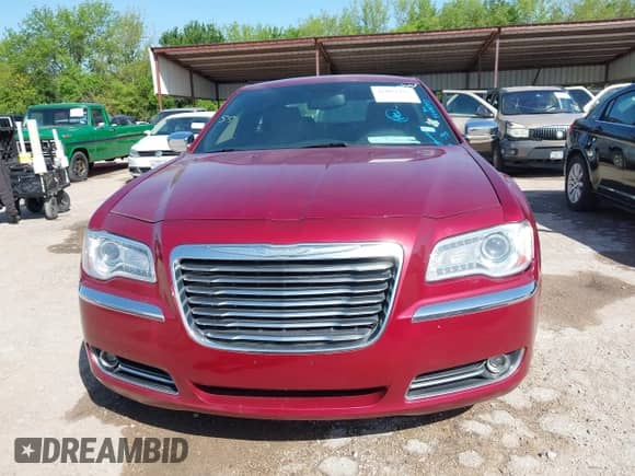 2014 Chrysler 300 C with VIN 2C3CCAEG5EH372859, listed as a IAAI auction lot 42004993 with 204,587 mi miles and . Bid and sale history available at DreamBid. Image 12.