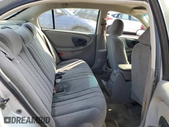 2003 Chevrolet Malibu z VIN 1G1ND52J53M700194, wystawiony jako Copart lot #72454574 z przebiegiem 136 497 mil mil oraz Szkoda całkowita • Salvage title. Historia ofert i sprzedaży dostępna na DreamBid. Obrazek 10.