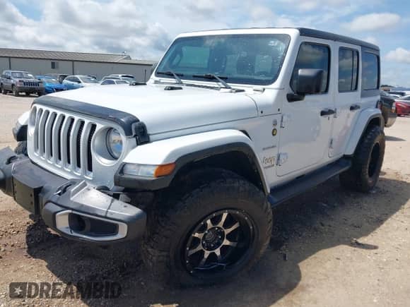 2022 Jeep Wrangler Unlimited Sahara z VIN 1C4HJXEN5NW144922, wystawiony jako IAAI lot #42452901 z przebiegiem 51 223 mil mil oraz . Historia ofert i sprzedaży dostępna na DreamBid. Obrazek 2.