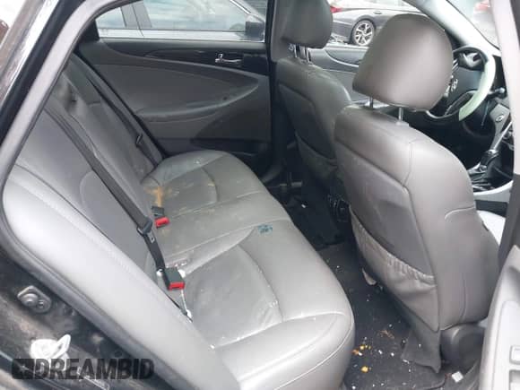 2013 Hyundai Sonata Limited z VIN 5NPEC4AC7DH621371, wystawiony jako IAAI lot #43580971 z przebiegiem 207 673 mil mil oraz . Historia ofert i sprzedaży dostępna na DreamBid. Obrazek 8.